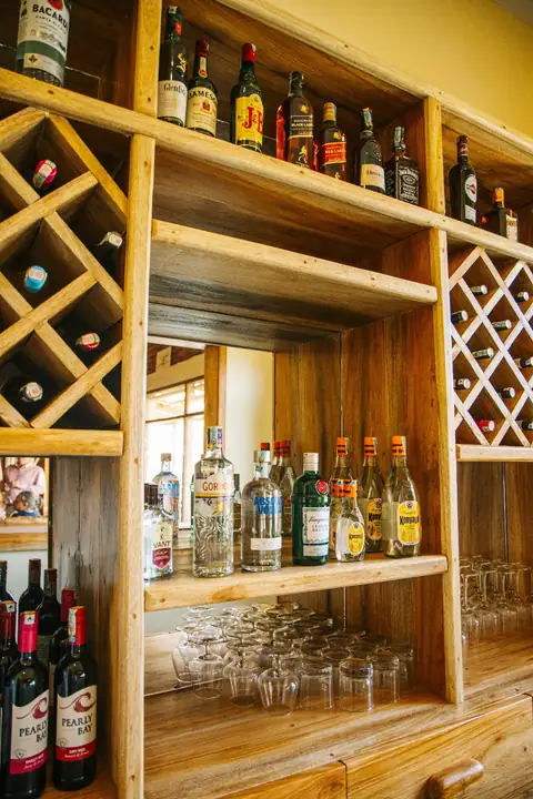 Bar shelves of wine and spirits