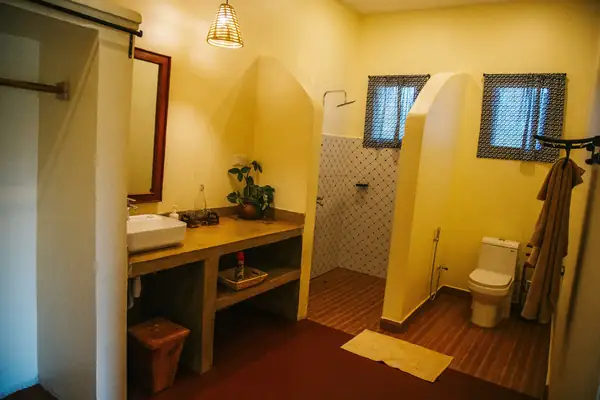 Bathroom with walk-in shower and separate WC